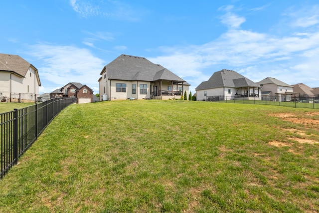 1132 Upland Ter, Clarksville, TN 37043 - rear view of house with a fenced backyard, a yard, and a residential view