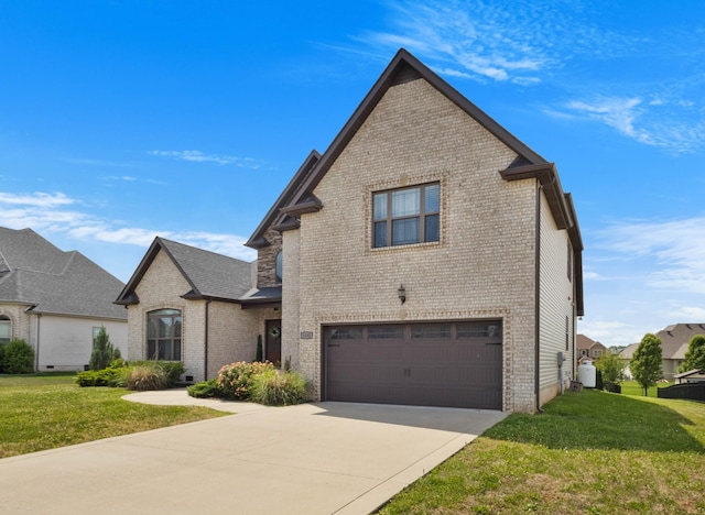 1132 Upland Ter, Clarksville, TN 37043 - view of front of property with brick siding, an attached garage, and driveway