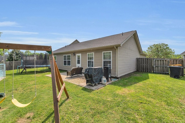 3005 Aruna Ct, Spring Hill, TN 37174 - rear view of house featuring a trampoline and a patio area