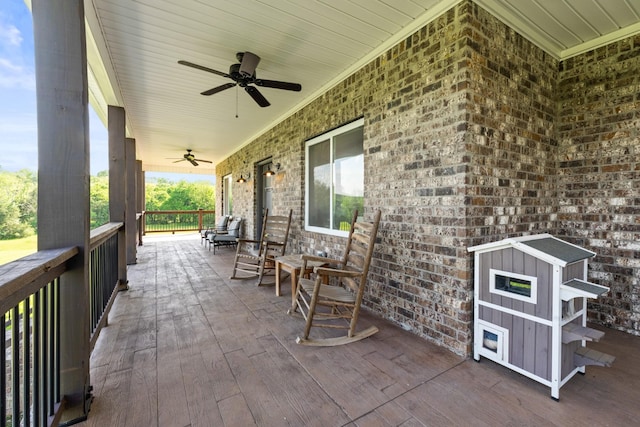 view of patio with covered porch and ceiling fan