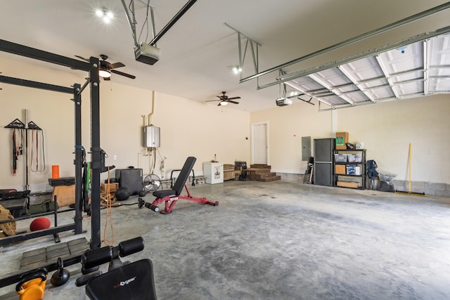 garage with a garage door opener and electric panel