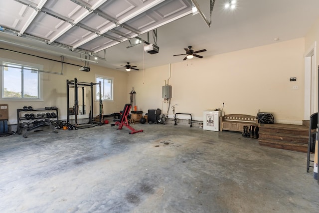 garage featuring a ceiling fan and a garage door opener