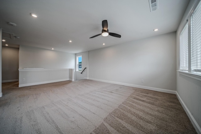 1055 Inez Dr, Smyrna, TN 37167 - spare room featuring ceiling fan, carpet floors, recessed lighting, and baseboards
