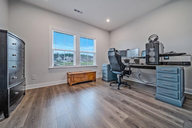1055 Inez Dr, Smyrna, TN 37167 - home office featuring dark wood-style floors, baseboards, and recessed lighting