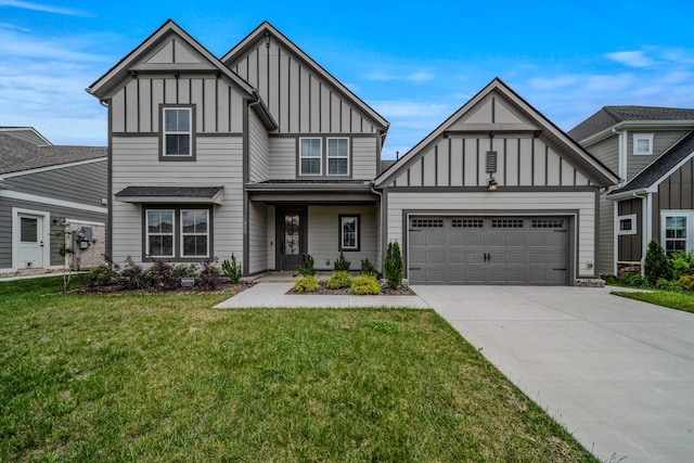 1055 Inez Dr, Smyrna, TN 37167 - english style home featuring board and batten siding, an attached garage, concrete driveway, and a front yard