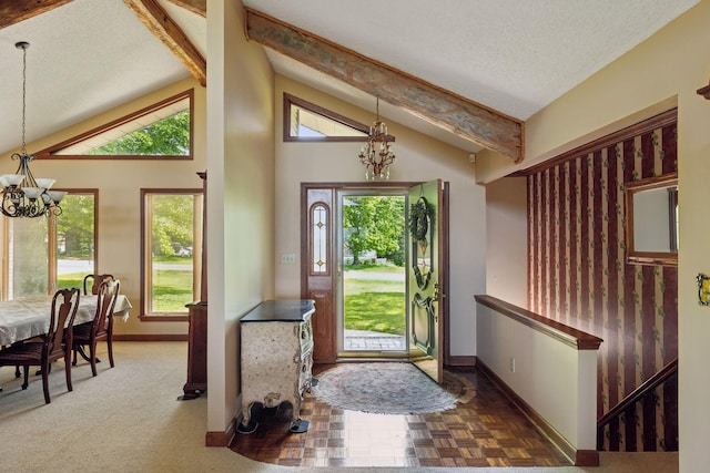 1314 Huntington Dr, Columbia, TN 38401 - foyer featuring baseboards, beam ceiling, a chandelier, and high vaulted ceiling
