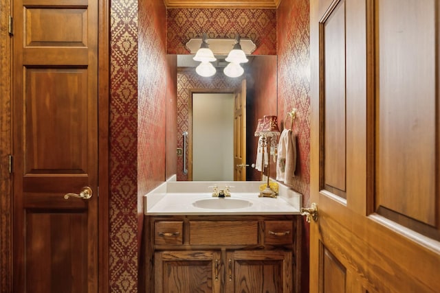 1314 Huntington Dr, Columbia, TN 38401 - bathroom featuring an inviting chandelier, vanity, and wallpapered walls