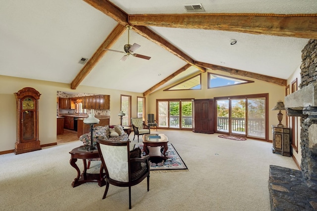 1314 Huntington Dr, Columbia, TN 38401 - living room with light colored carpet, visible vents, a stone fireplace, and beam ceiling