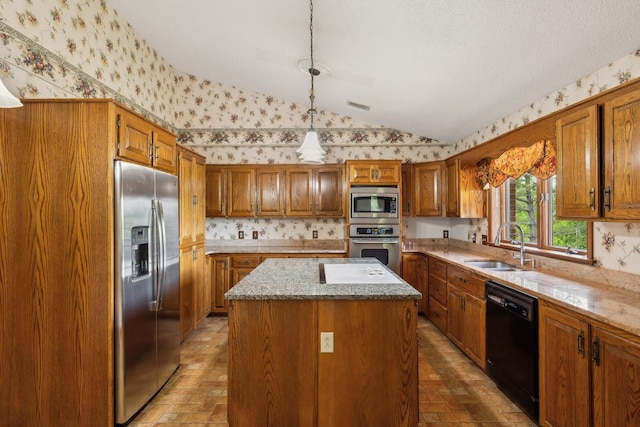 1314 Huntington Dr, Columbia, TN 38401 - kitchen featuring wallpapered walls, appliances with stainless steel finishes, and a sink