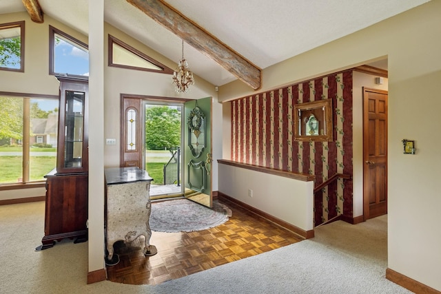 1314 Huntington Dr, Columbia, TN 38401 - carpeted entryway featuring baseboards, a chandelier, and vaulted ceiling with beams