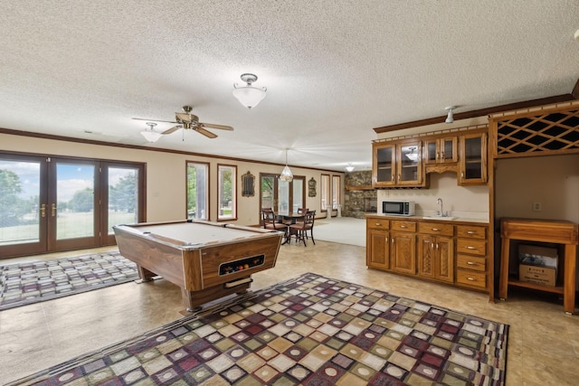 1314 Huntington Dr, Columbia, TN 38401 - playroom featuring crown molding, pool table, french doors, and a textured ceiling