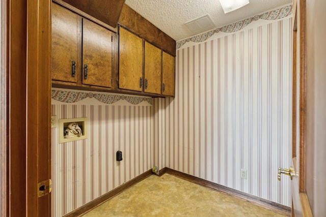 1314 Huntington Dr, Columbia, TN 38401 - washroom featuring hookup for a washing machine, wallpapered walls, and cabinet space