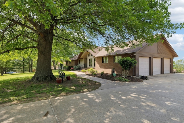 1314 Huntington Dr, Columbia, TN 38401 - ranch-style house featuring brick siding, driveway, roof with shingles, and a garage