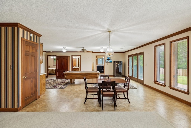 1314 Huntington Dr, Columbia, TN 38401 - dining area featuring a textured ceiling, ornamental molding, baseboards, and light floors