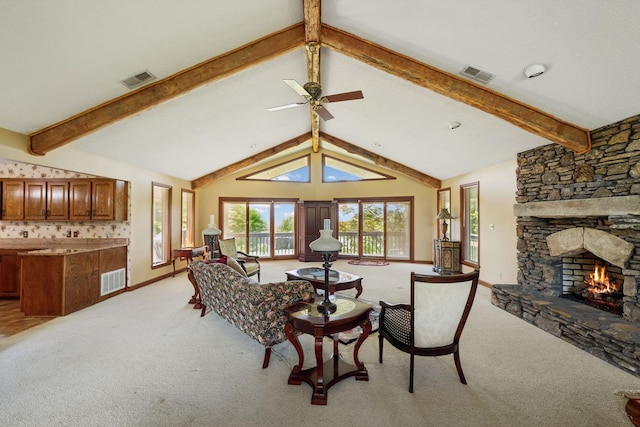 1314 Huntington Dr, Columbia, TN 38401 - living room with visible vents, a stone fireplace, and light colored carpet