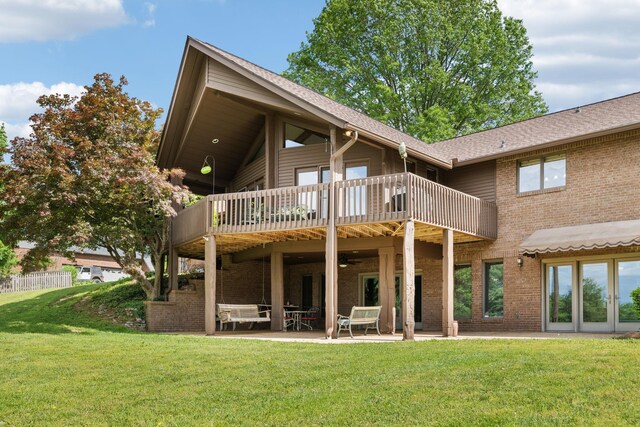 1314 Huntington Dr, Columbia, TN 38401 - back of property with roof with shingles, a lawn, a patio area, brick siding, and a balcony