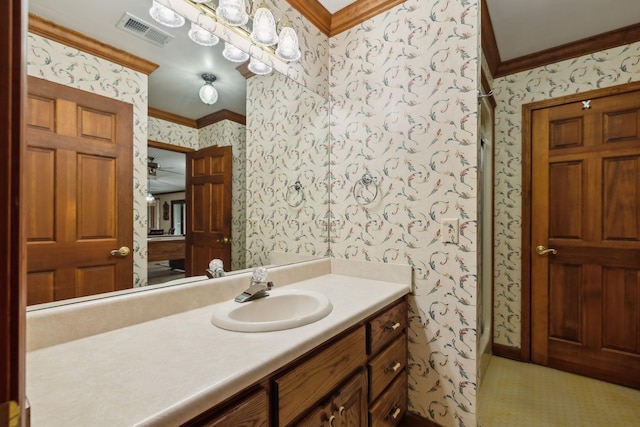1314 Huntington Dr, Columbia, TN 38401 - bathroom with crown molding, vanity, visible vents, and wallpapered walls
