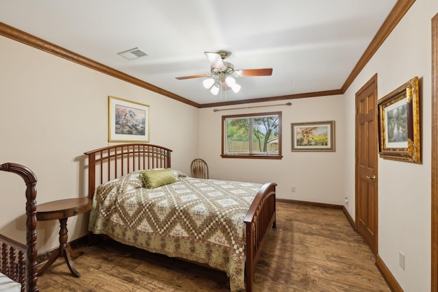 1314 Huntington Dr, Columbia, TN 38401 - bedroom with crown molding, baseboards, dark wood-style floors, and visible vents
