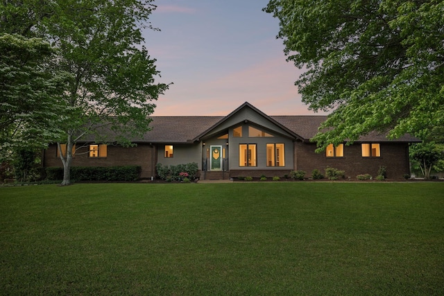 1314 Huntington Dr, Columbia, TN 38401 - view of front of home with a yard and brick siding