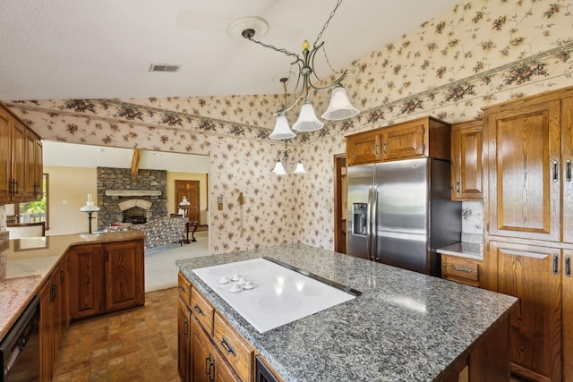 1314 Huntington Dr, Columbia, TN 38401 - kitchen with visible vents, white electric stovetop, black dishwasher, stainless steel fridge with ice dispenser, and vaulted ceiling
