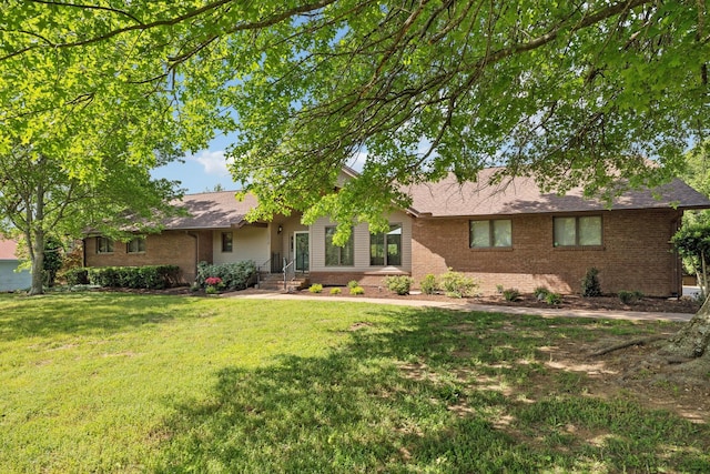 1314 Huntington Dr, Columbia, TN 38401 - ranch-style home featuring brick siding and a front lawn