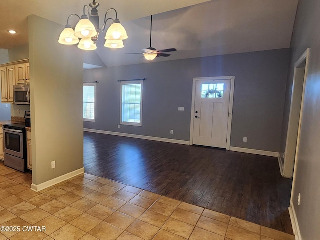 85 Neshova Ln, Henderson, TN 38340 - entryway featuring baseboards, light wood finished floors, ceiling fan with notable chandelier, and a healthy amount of sunlight