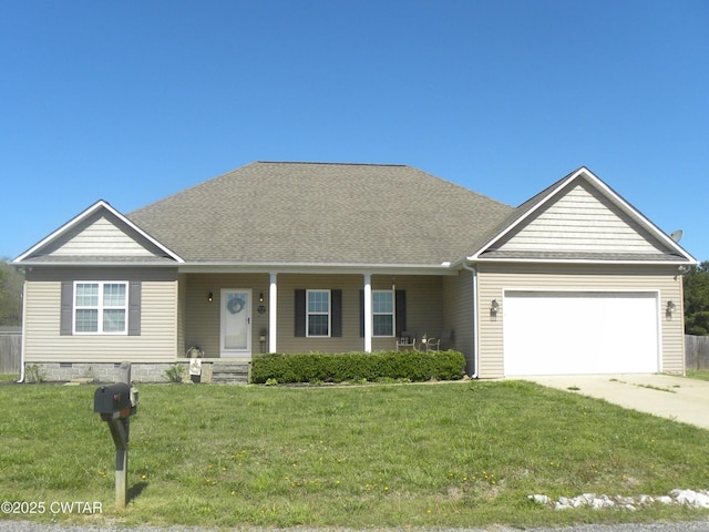 85 Neshova Ln, Henderson, TN 38340 - ranch-style house with an attached garage, a front lawn, covered porch, and concrete driveway