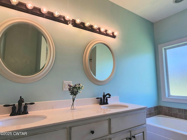 85 Neshova Ln, Henderson, TN 38340 - bathroom featuring a garden tub, a sink, and double vanity