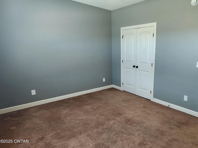 85 Neshova Ln, Henderson, TN 38340 - unfurnished room with baseboards and dark colored carpet