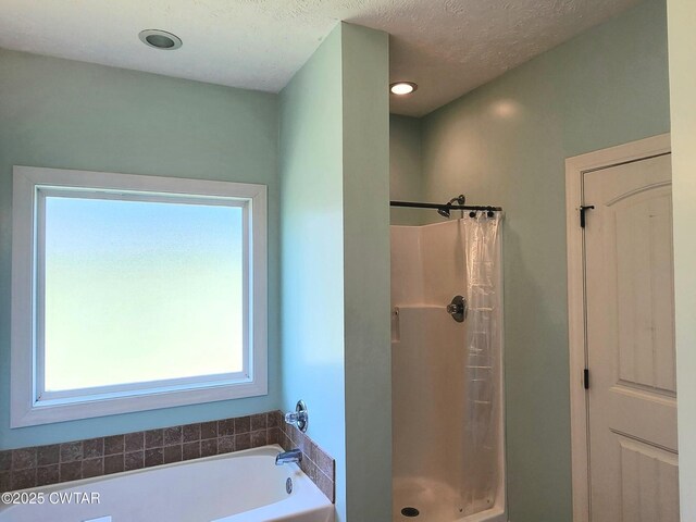 85 Neshova Ln, Henderson, TN 38340 - bathroom featuring a garden tub and a stall shower