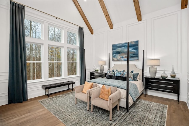7258 Murrel Dr, Franklin, TN 37064 - bedroom with wood finished floors, high vaulted ceiling, a decorative wall, and beam ceiling
