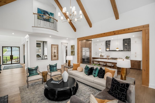 7258 Murrel Dr, Franklin, TN 37064 - living room featuring an inviting chandelier, high vaulted ceiling, baseboards, wood finished floors, and beamed ceiling
