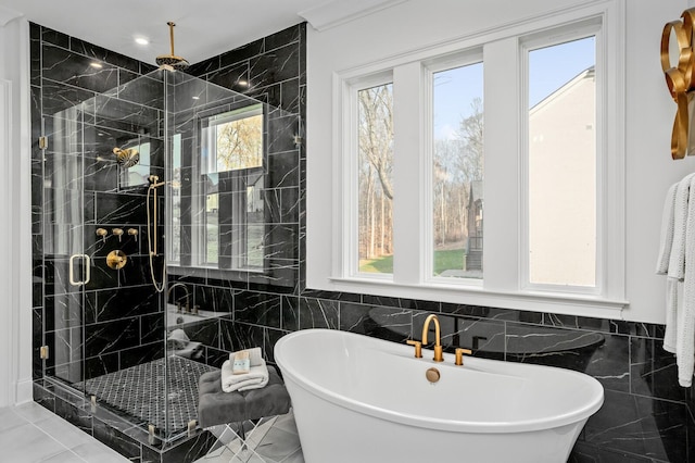 7258 Murrel Dr, Franklin, TN 37064 - bathroom with tile walls, a soaking tub, and a stall shower