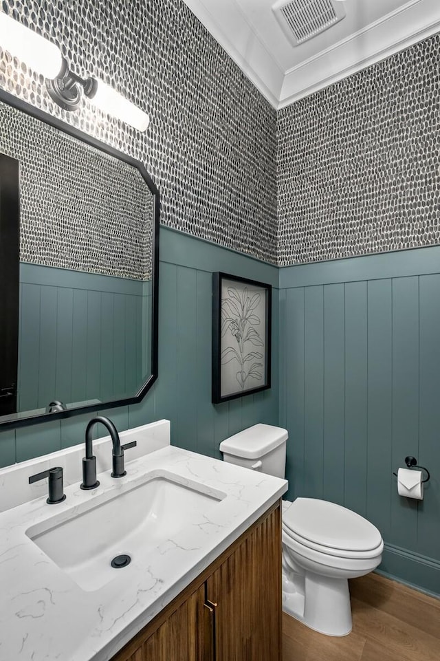 7258 Murrel Dr, Franklin, TN 37064 - half bathroom with vanity, toilet, wood finished floors, and visible vents