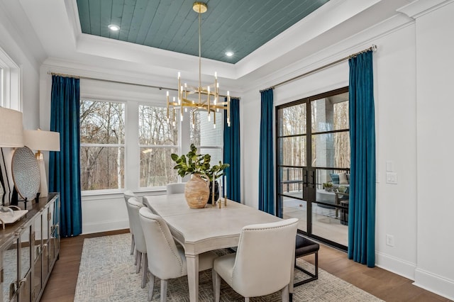 7258 Murrel Dr, Franklin, TN 37064 - dining space featuring a tray ceiling, a notable chandelier, and plenty of natural light