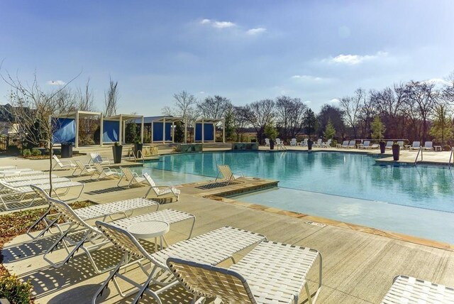 152 Salton Ln, Spring Hill, TN 37174 - community pool featuring a patio