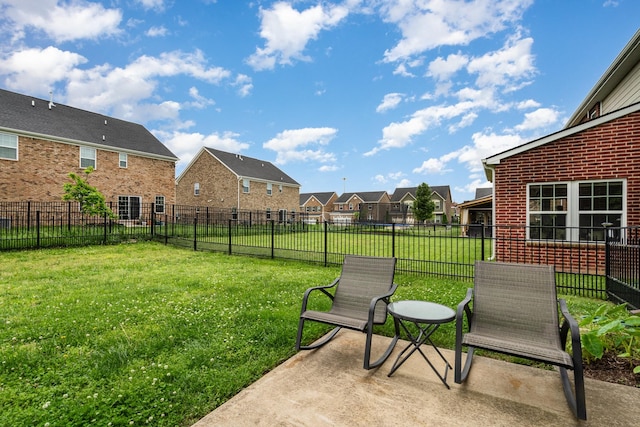 view of yard with fence and a residential view