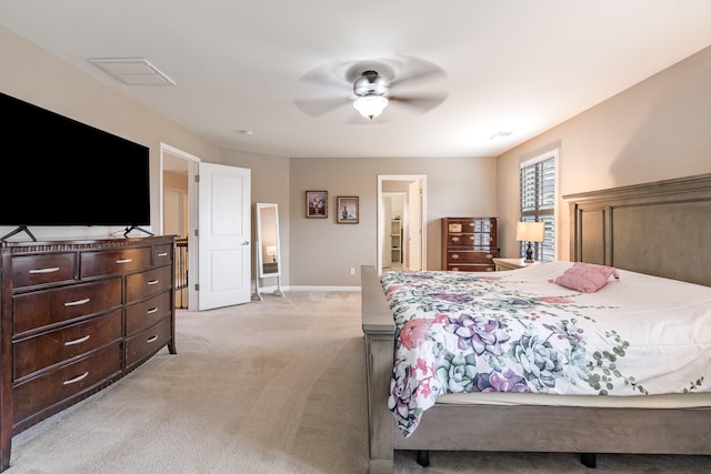 bedroom with ceiling fan, light colored carpet, baseboards, and visible vents