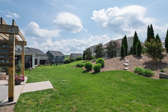 view of yard featuring a residential view
