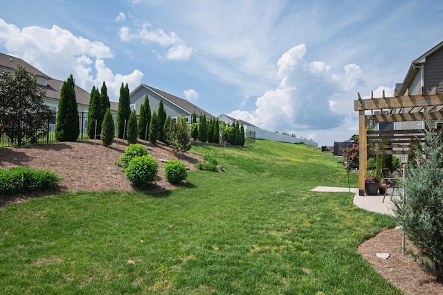 view of yard featuring a pergola and a patio area