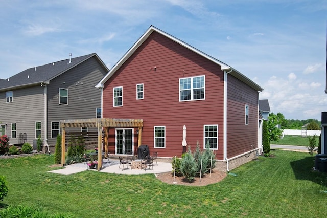rear view of property featuring a patio area, a yard, and a pergola