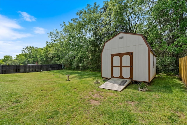 206 Hart Ln, Lebanon, TN 37087 - view of yard with a storage unit, a fenced backyard, and an outdoor structure