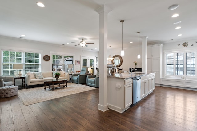 206 Hart Ln, Lebanon, TN 37087 - kitchen featuring stainless steel dishwasher, ornamental molding, open floor plan, a sink, and ceiling fan with notable chandelier