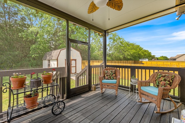 206 Hart Ln, Lebanon, TN 37087 - wooden terrace featuring a ceiling fan, an outbuilding, a fenced backyard, and a storage unit