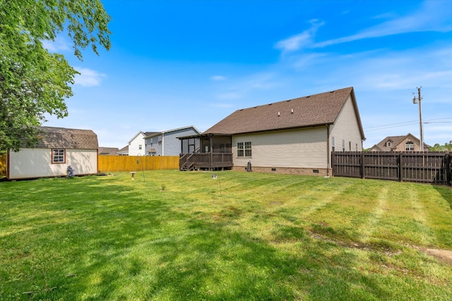 206 Hart Ln, Lebanon, TN 37087 - exterior space featuring a storage unit, a wooden deck, a sunroom, a fenced backyard, and an outdoor structure