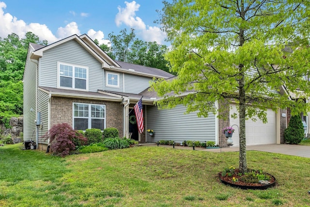 traditional-style house with an attached garage, driveway, brick siding, and a front yard