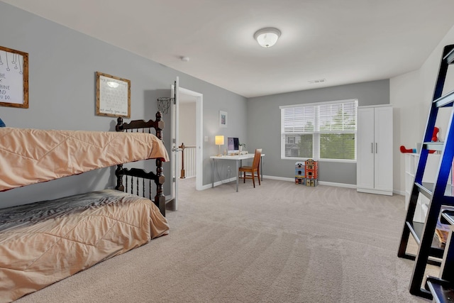 bedroom with baseboards, carpet, and visible vents