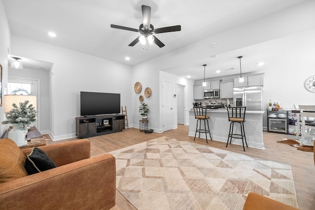 532 Herman Dr, Clarksville, TN 37042 - living room with a ceiling fan, light wood finished floors, recessed lighting, and baseboards