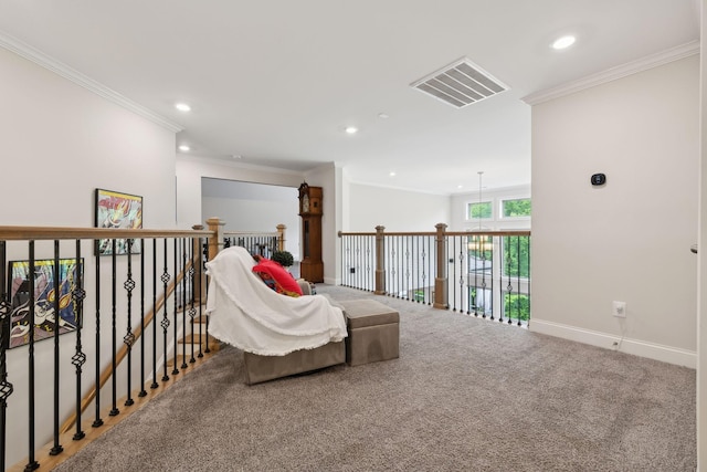sitting room featuring visible vents, recessed lighting, carpet floors, and ornamental molding