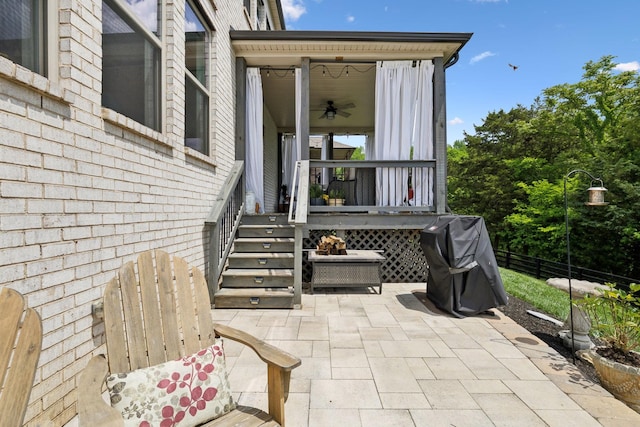 view of patio / terrace featuring ceiling fan and area for grilling